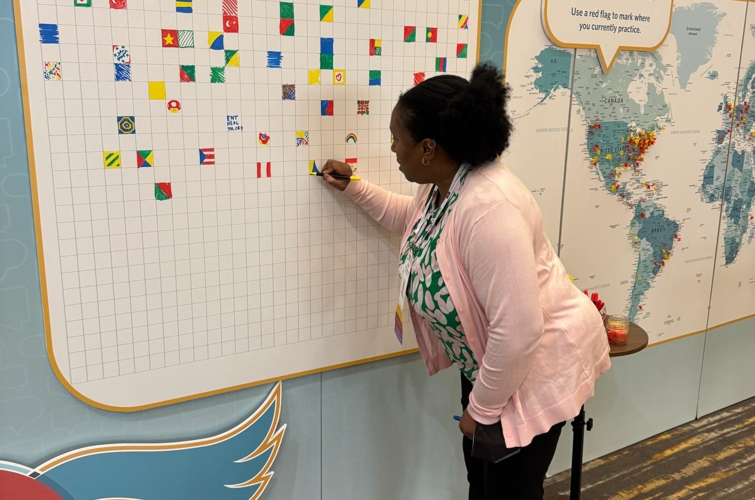 Woman coloring square at Talking Point