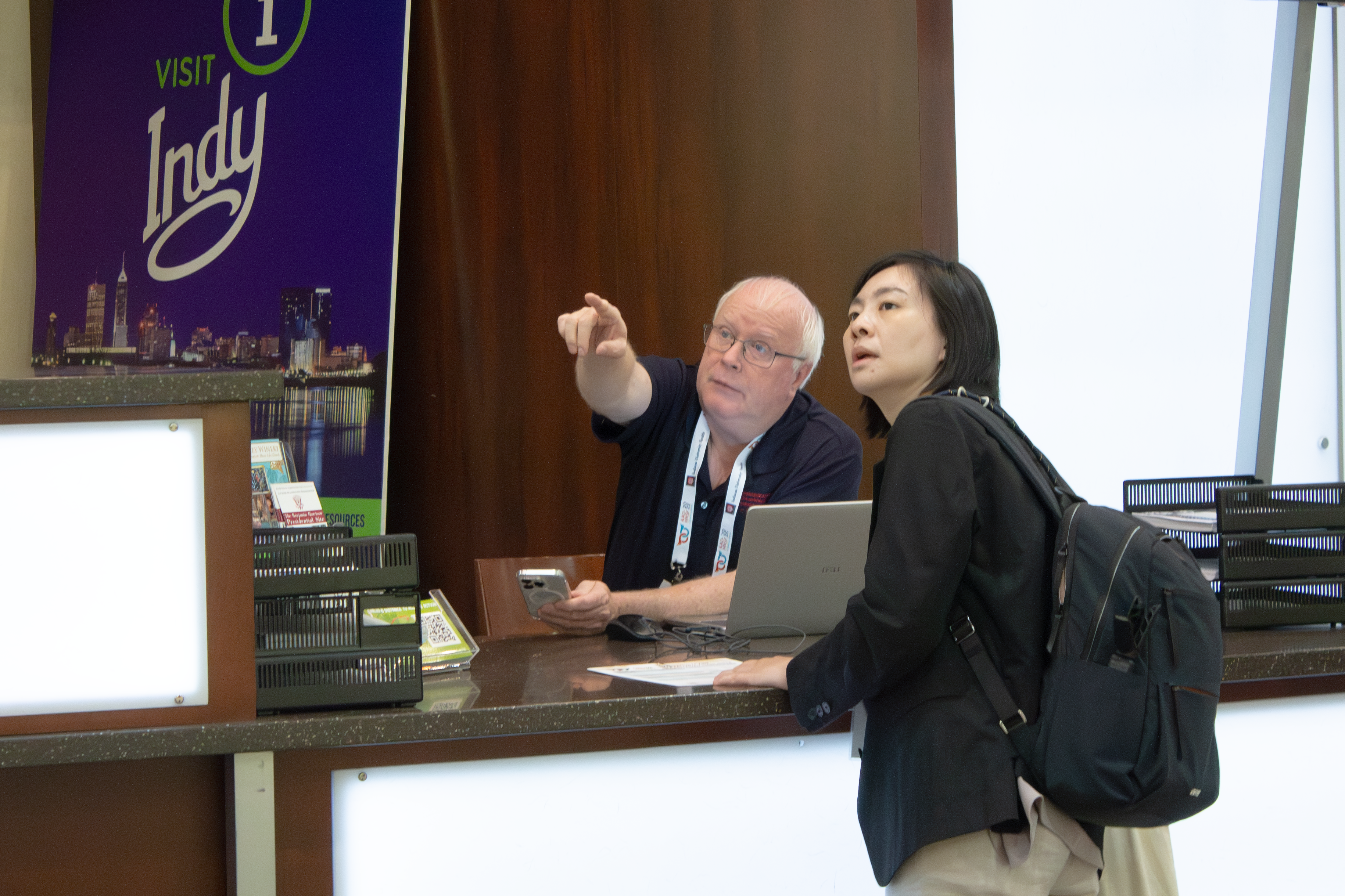 Giving directions at information booth