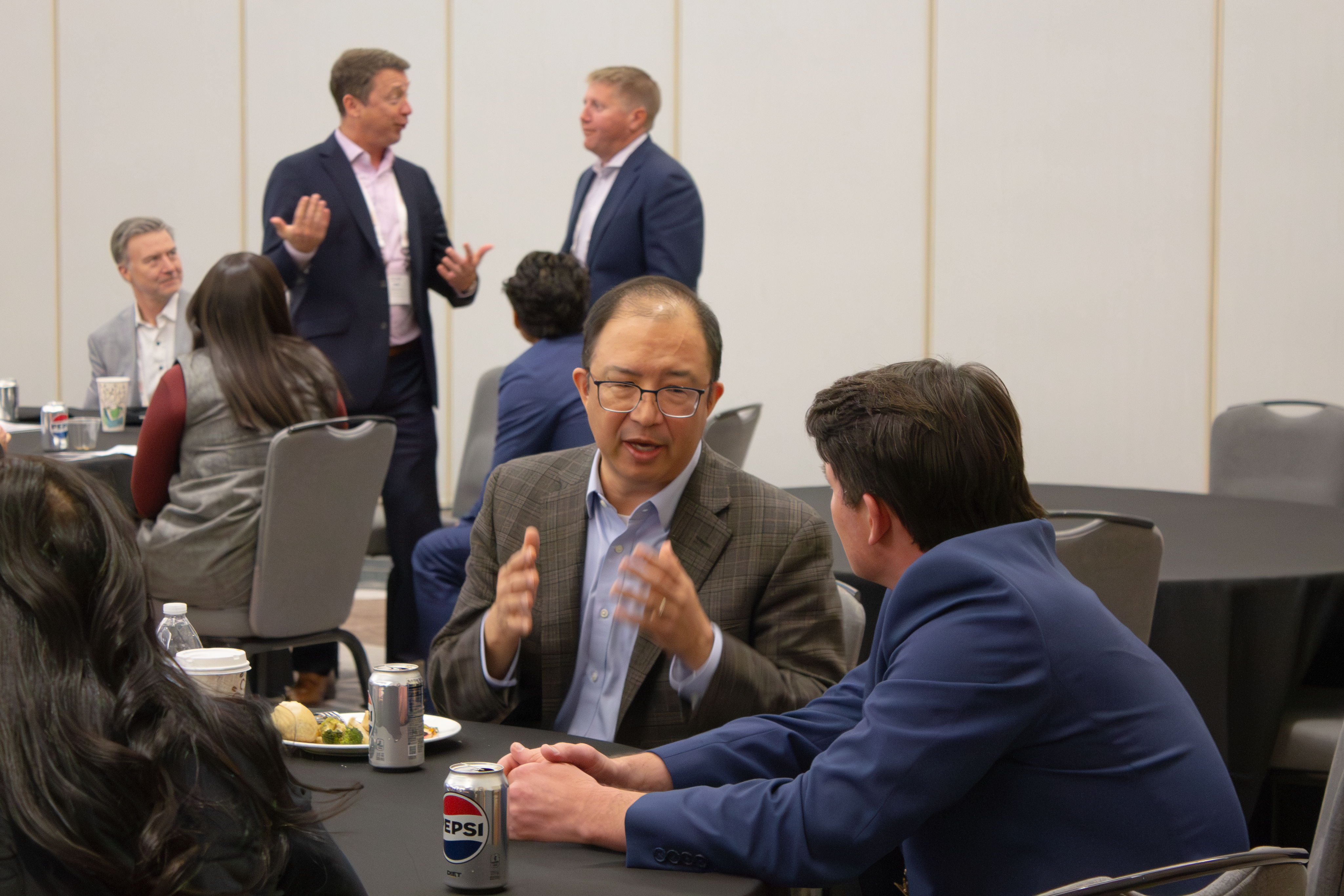 Attendees chatting at Innovation Connection
