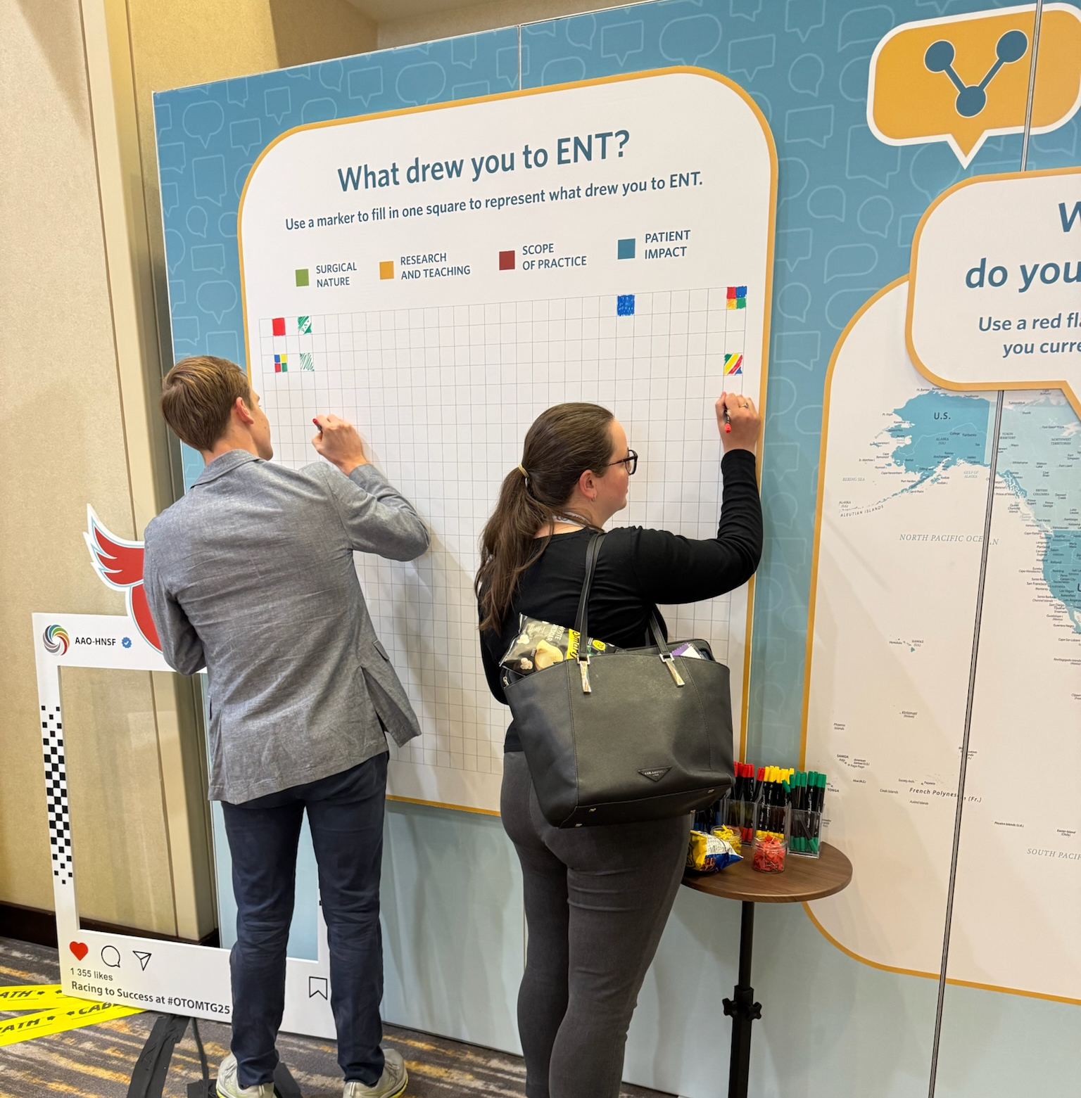 Two people participating in interactive activity at the Talking Point