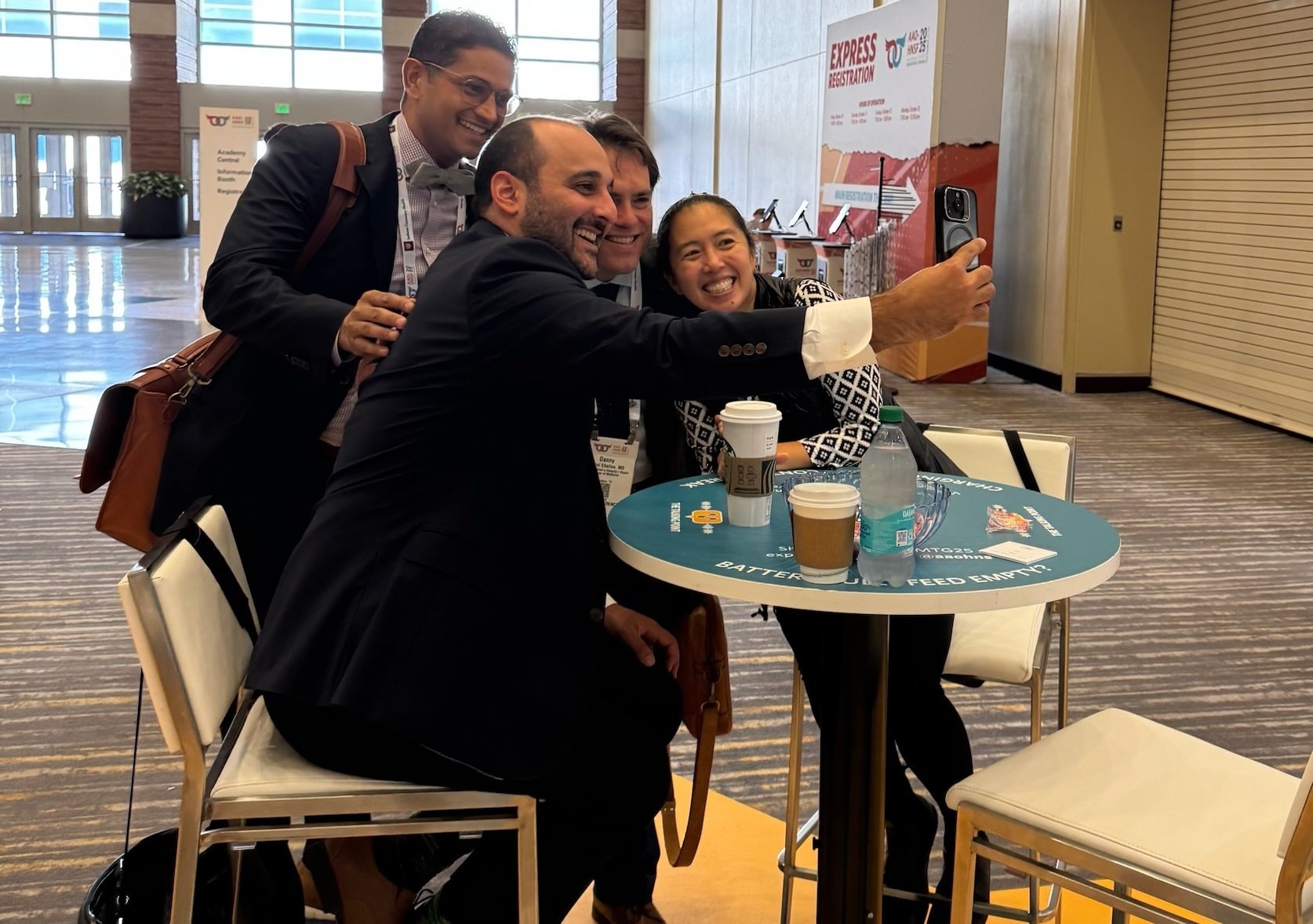 Attendees taking selfie
