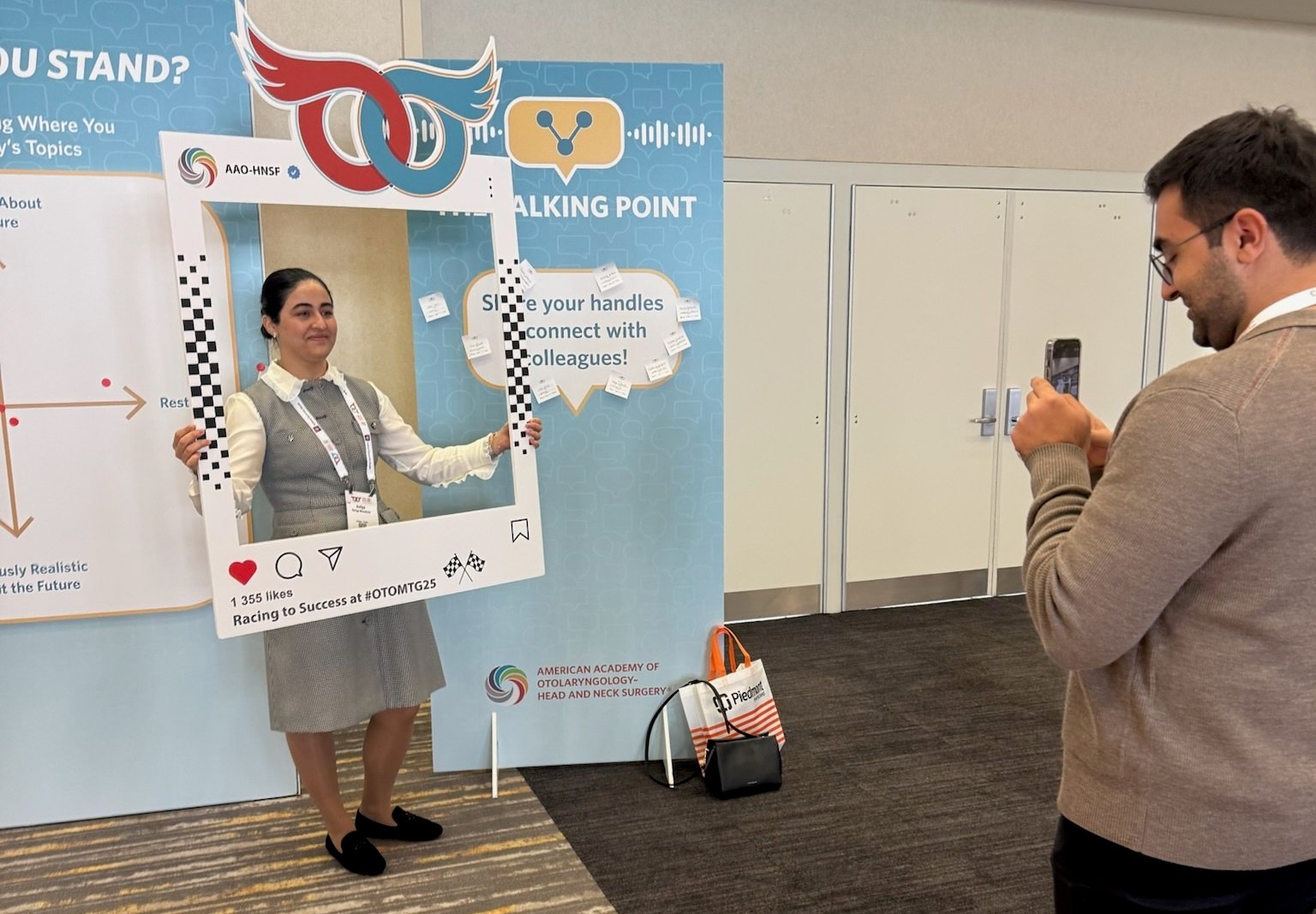 Attendee taking photo at the Talking Point