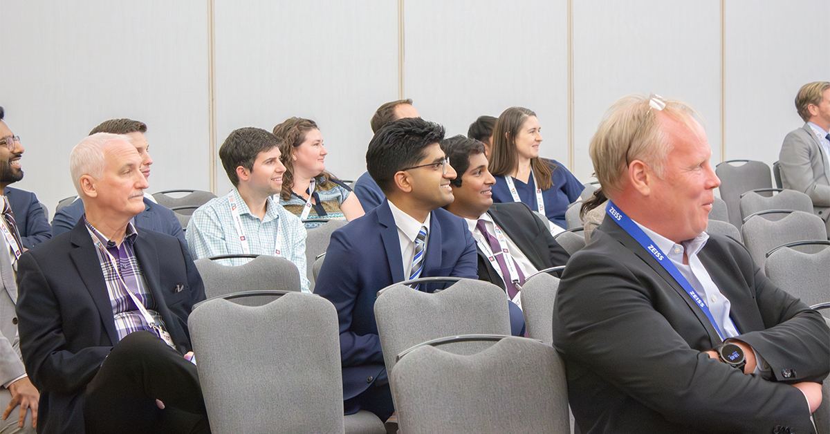 Group of session attendees looking at the stage