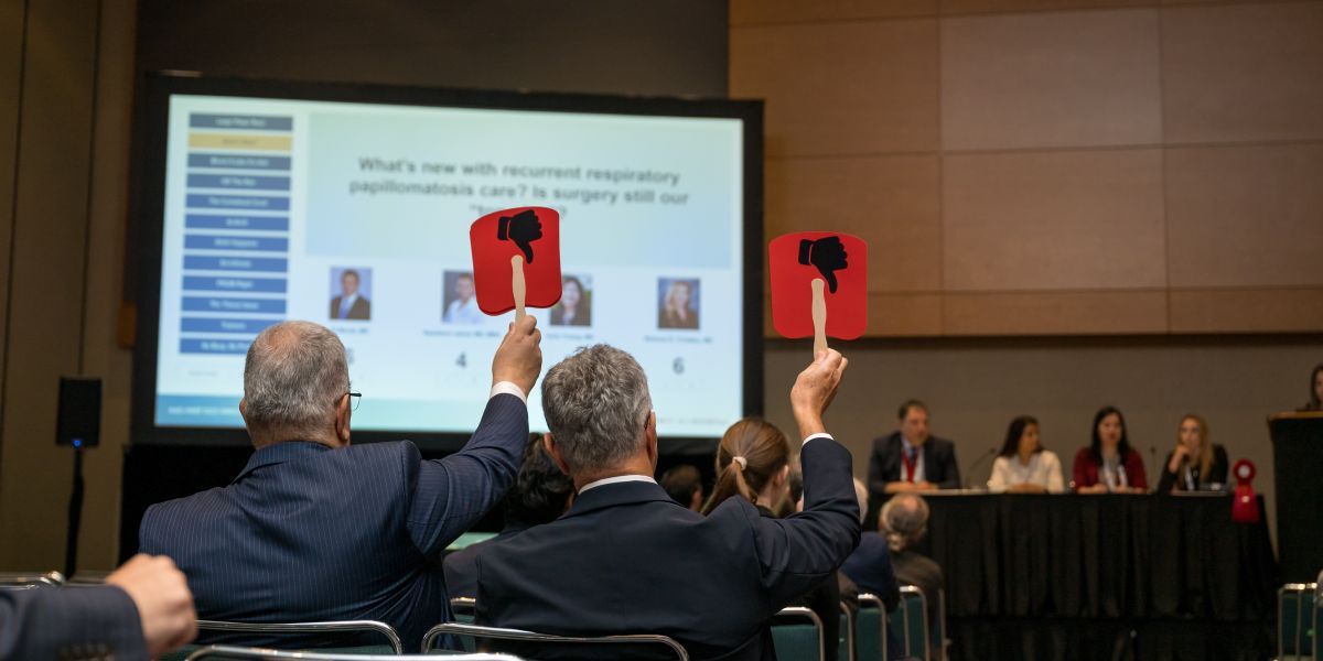 Audience members participate in Pardon the OTO-ruption. 