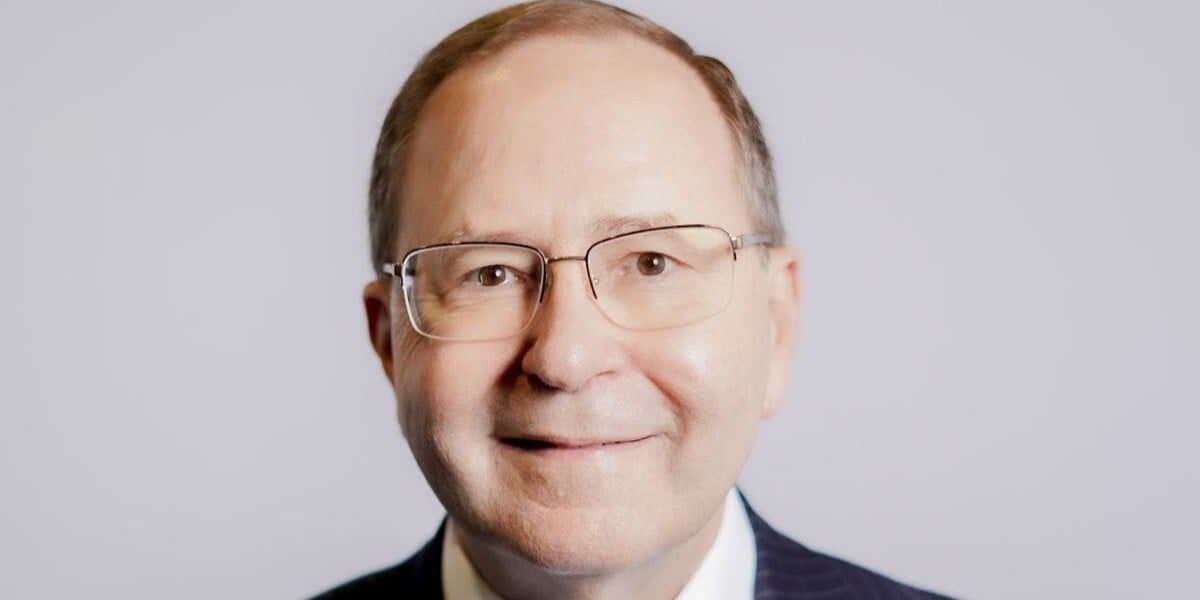 A headshot of Dr. James Denneny.